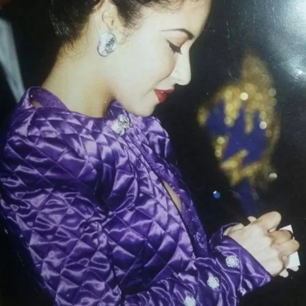selena-purple-jacket-1.webp