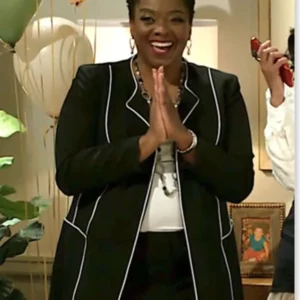 mona-wilson-coat.webp